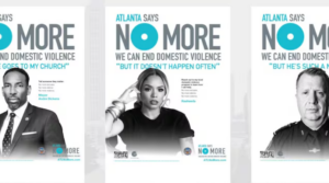 Three posters read “Atlanta says NO MORE. We can end domestic violence.” Each features a different person: a man in a suit, a woman with a serious expression, and a man in uniform, all supporting the campaign.