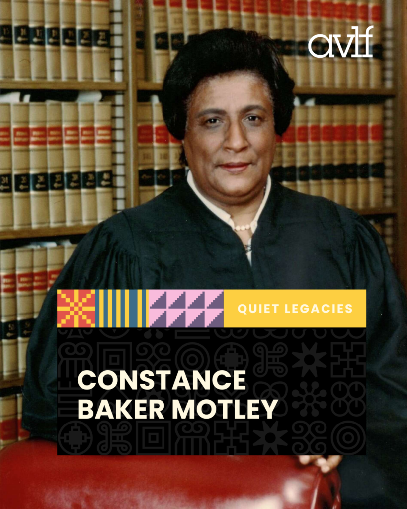 A dignified woman in a black judge's robe sits in front of shelves filled with law books. Text on the image reads "Quiet Legacies: Constance Baker Motley" and displays a colorful AVLF logo.